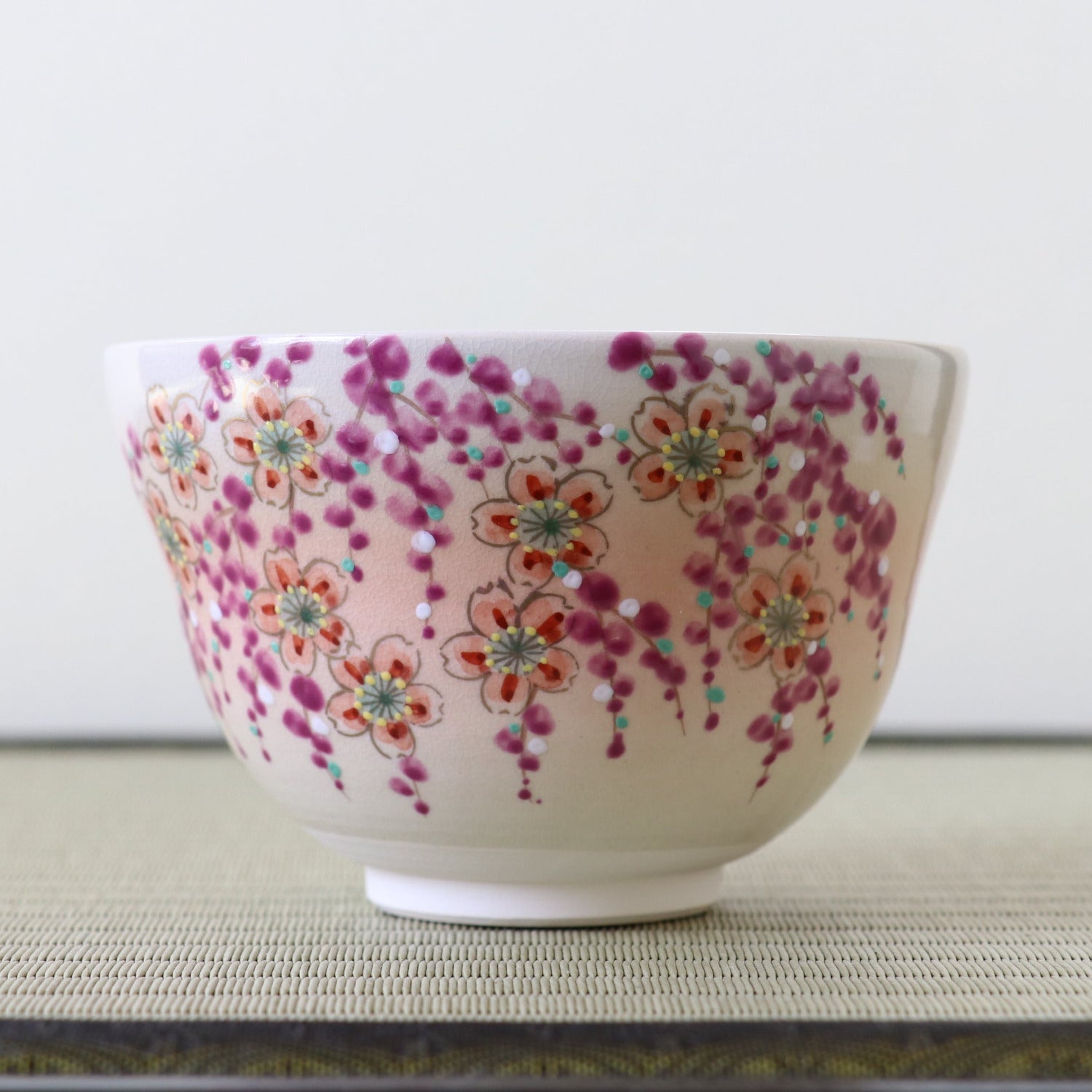 Ceramic bowl with floral pattern on a white background