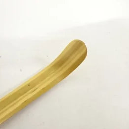 Wooden spoon on a white background