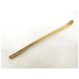 Wooden spoon on a white background