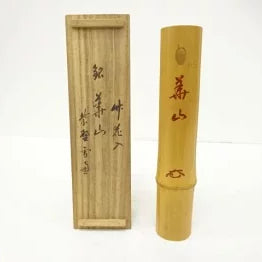 Bamboo incense stick with wooden box on a white background