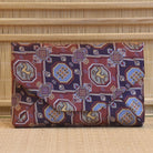Japanese traditional textile patterned clutch bag on a textured surface
