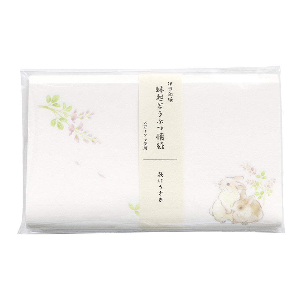 Packaged product with floral design and text on a white background