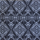 Geometric pattern with black and white diamonds on a blue background