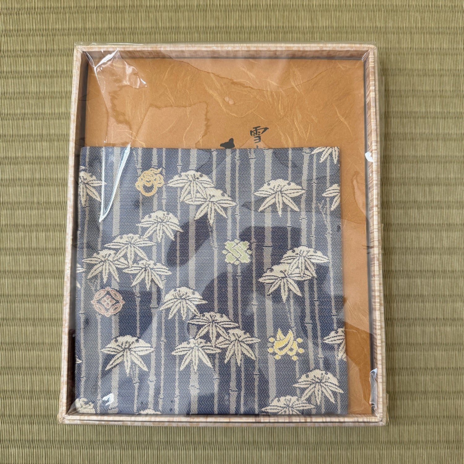 Packaged product with floral design on a textured surface
