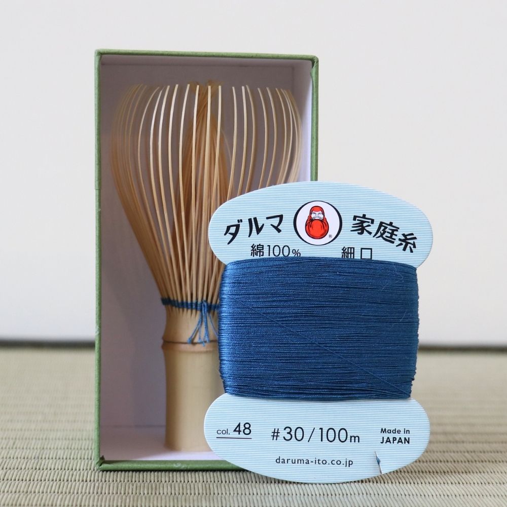 Matcha tea whisk with Teal blue thread accent by Kubo Ryosai