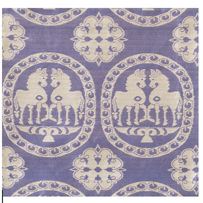 Patterned fabric with horse design on a blue background