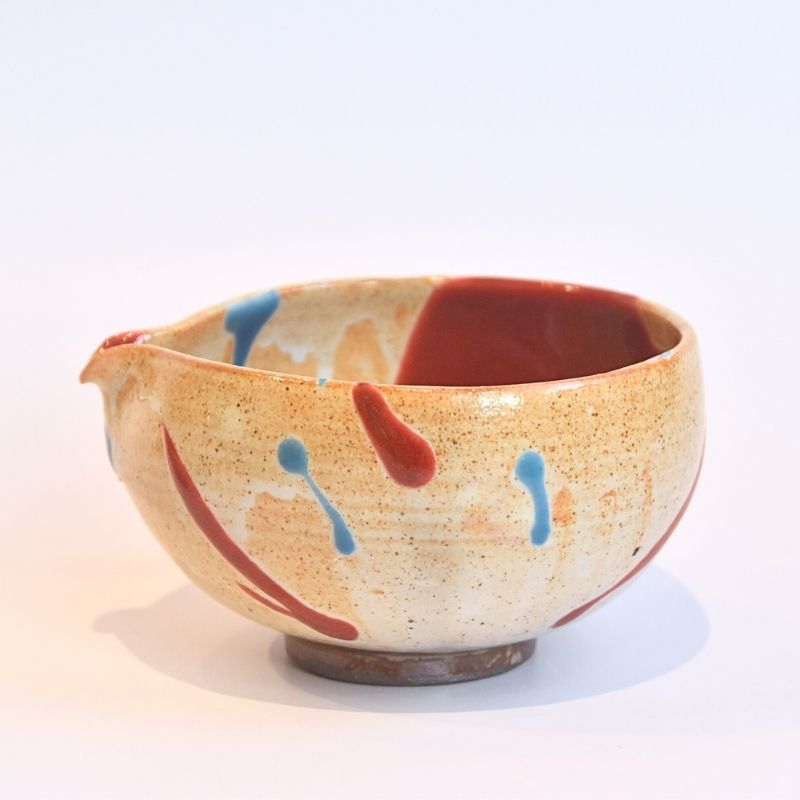Ceramic bowl with abstract design on a white background