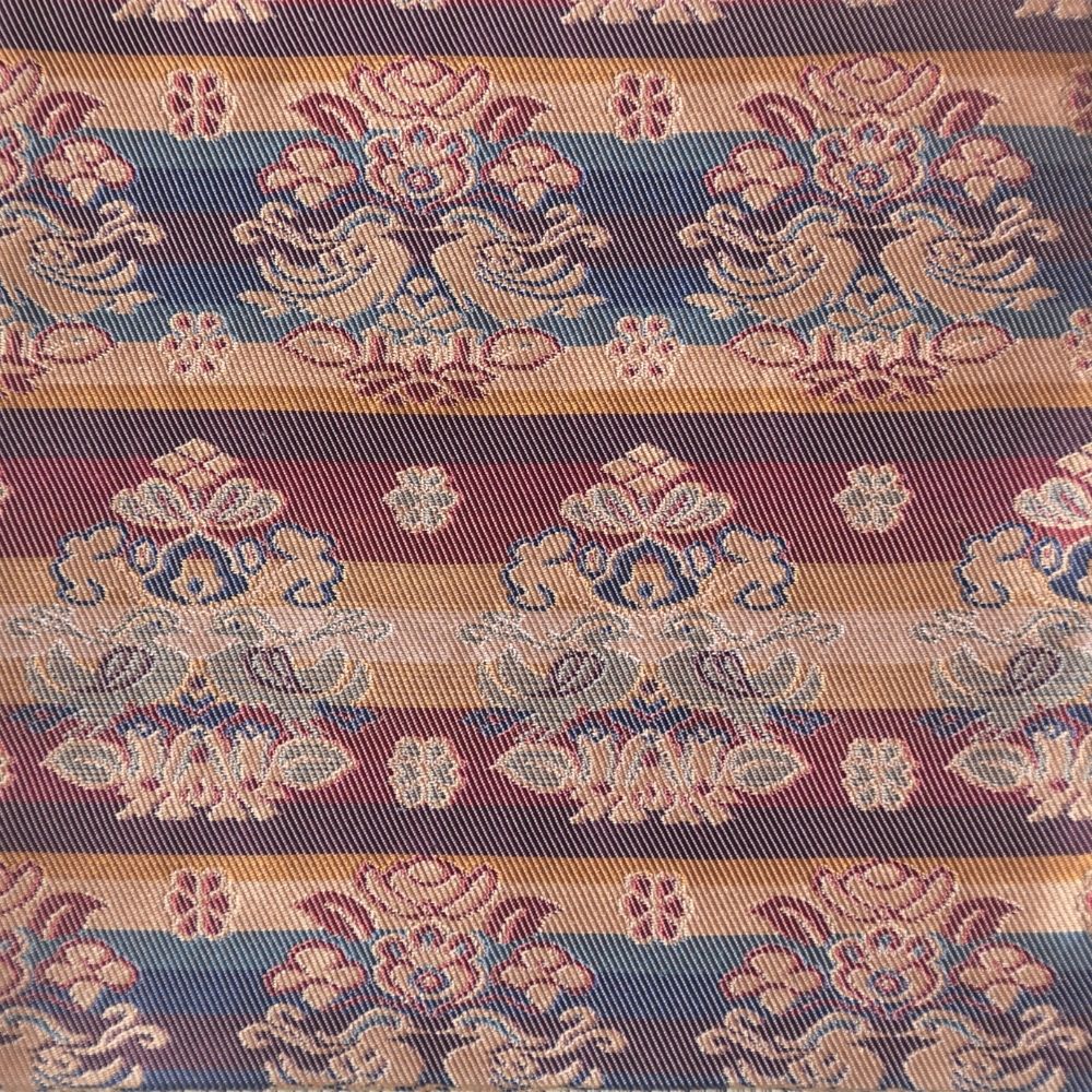 Decorative fabric with floral pattern and multicolor stripes