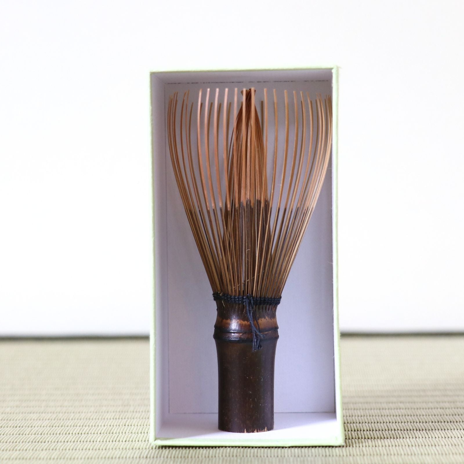 Handcrafted Japanese chasen by tea master Tango Tanimura, used for traditional matcha preparation