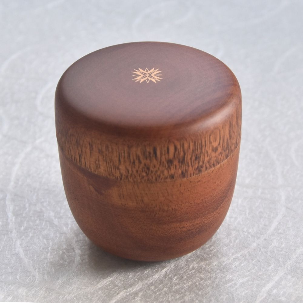 Wood with a star design on a white background
