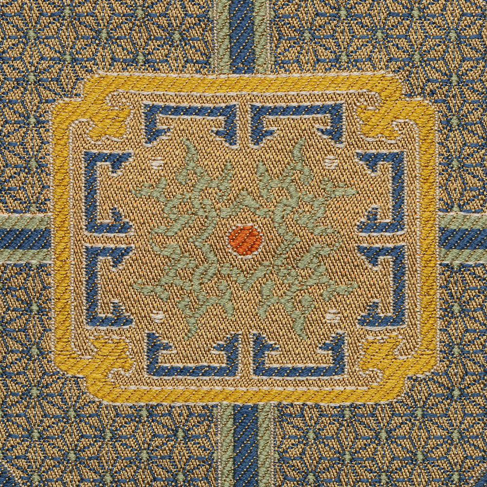 Close-up of the Blue Dragon motif woven into Kyoto Nishijin silk brocade