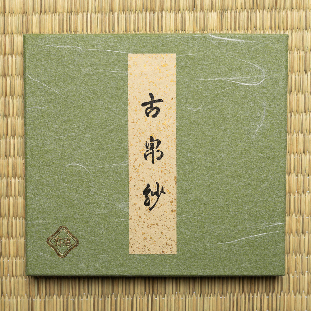 Green presentation box for the Chitose-bon kobukusa with a vertical Japanese paper label.