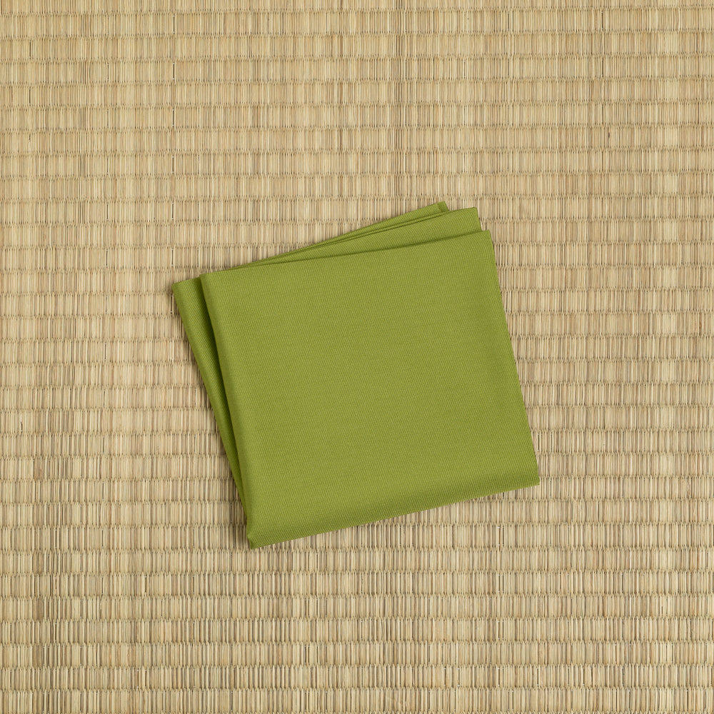 Choji Moss Green silk fukusa displayed on tatami for Japanese tea ceremony
