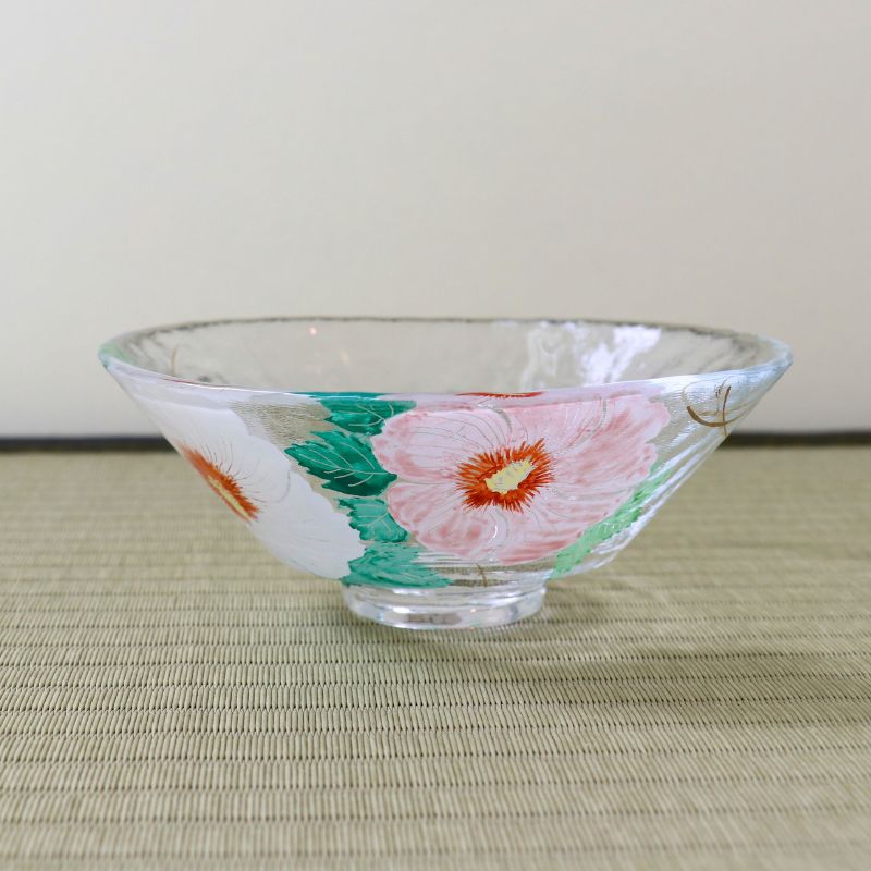 Side view of shallow glass matcha bowl decorated with pink and white Rose of Sharon flowers