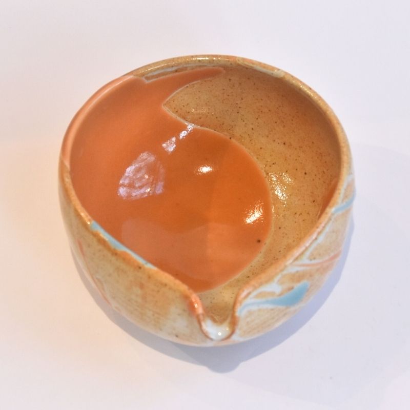 Ceramic bowl with a unique design on a white background