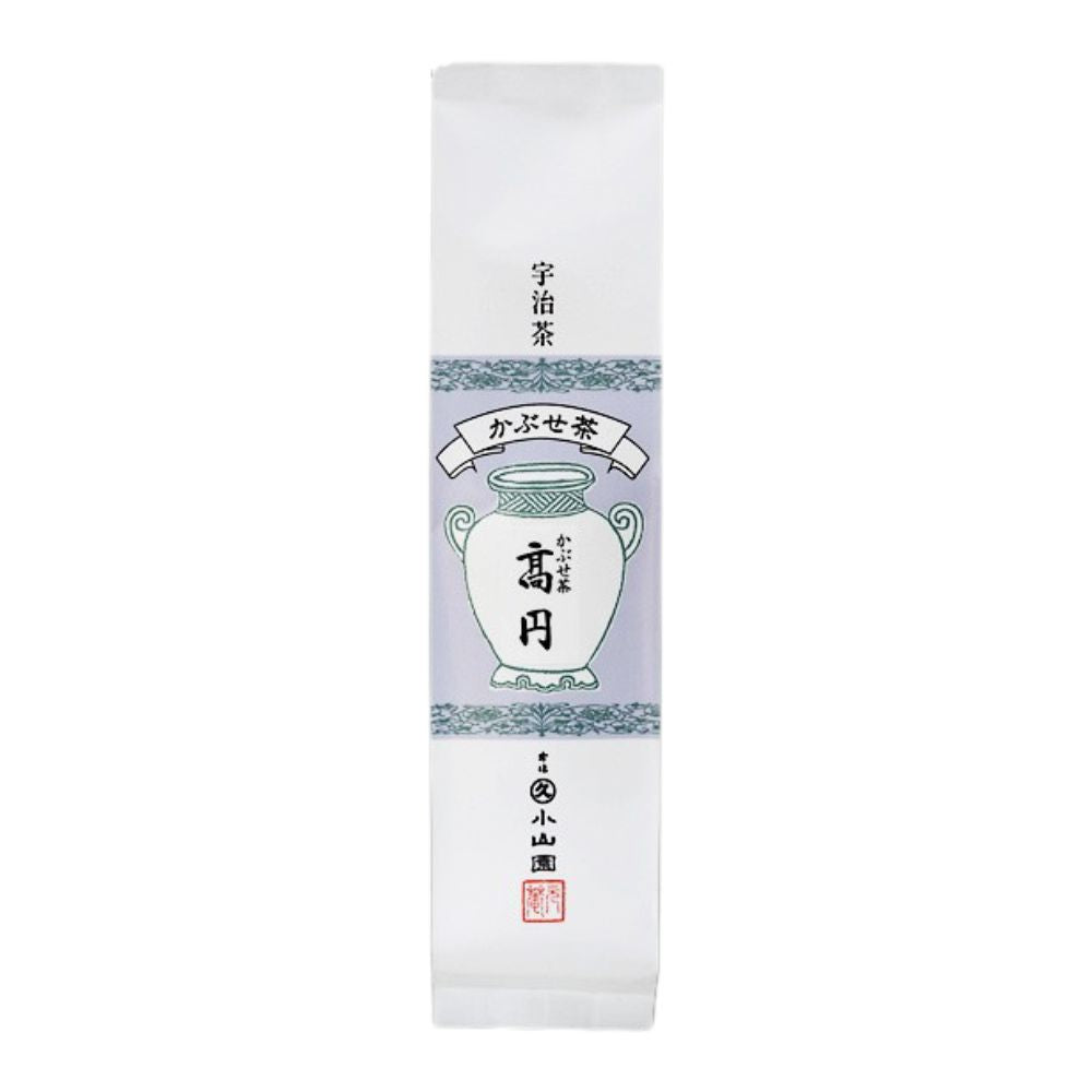 Tea packaging with a traditional design on a white background