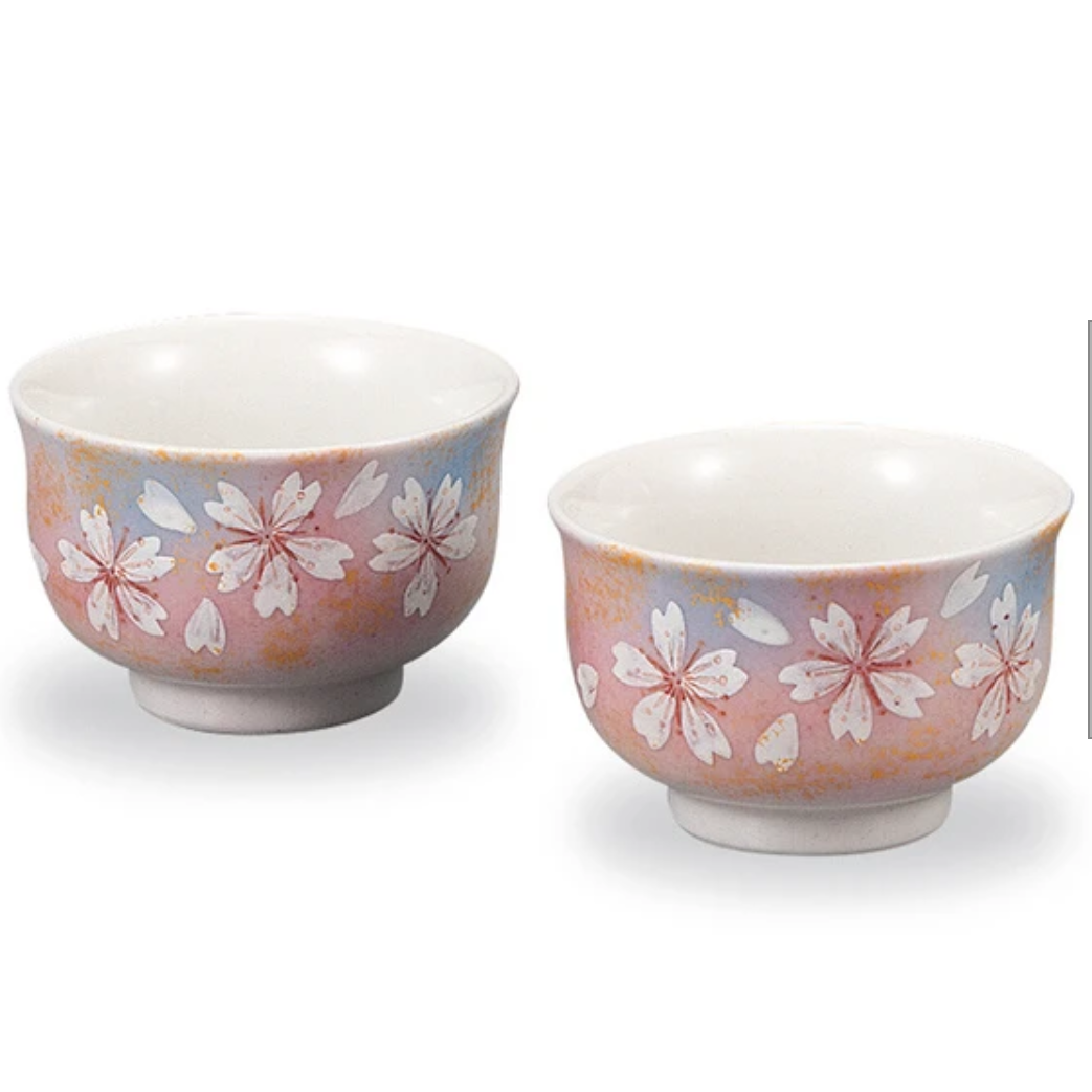 Two ceramic bowls with floral patterns on a white background