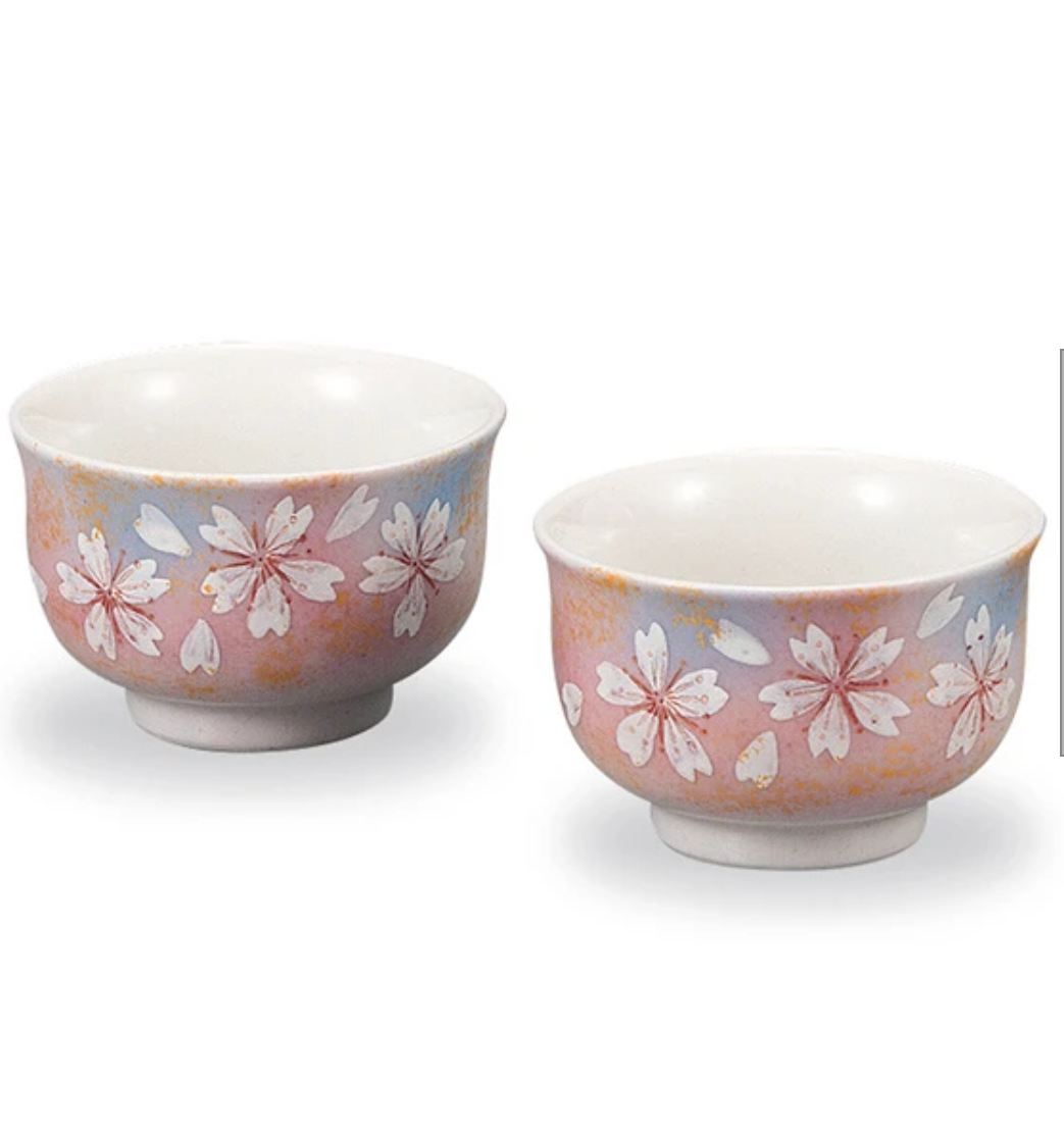 Two ceramic bowls with floral patterns on a white background