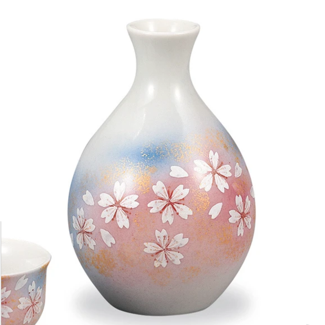 Ceramic vase with floral design on a white background