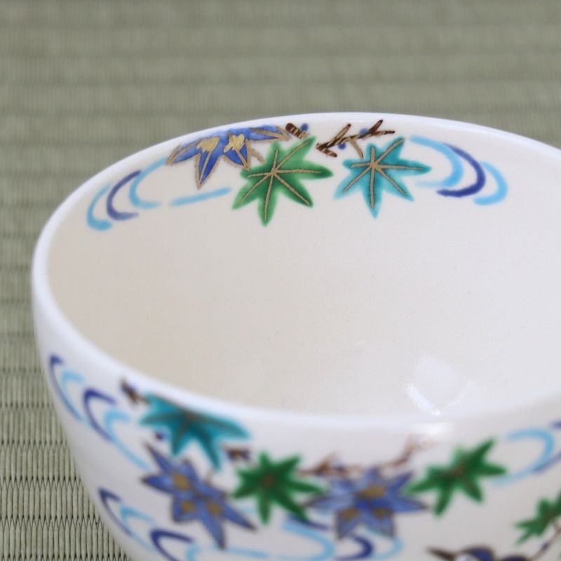 Top interior view of the Kyo-yaki Aokaede matcha bowl showing green maple leaves and blue flowing water extending around the inner rim