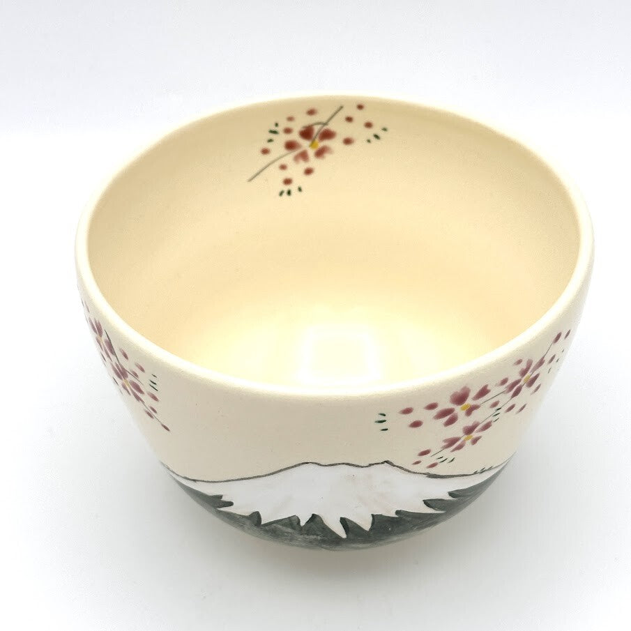 Top interior view of the Kyo-yaki Mt. Fuji matcha bowl showing its warm ivory glaze and hand-painted pink blossom details