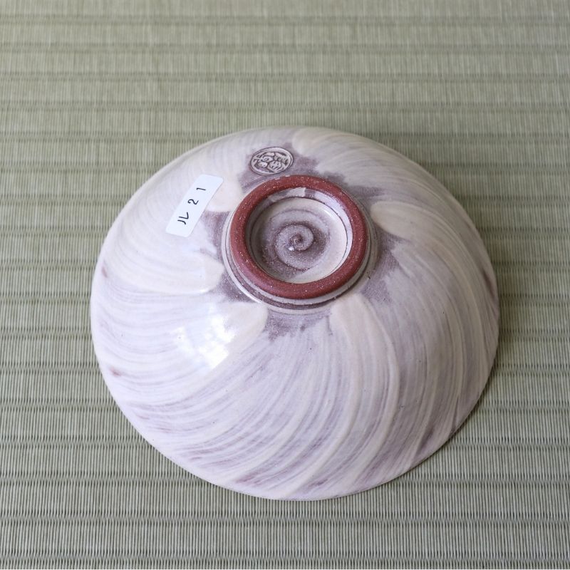 Close-up of the raised foot and pale lavender glazed underside of the Morisato Touraku Hira Chawan