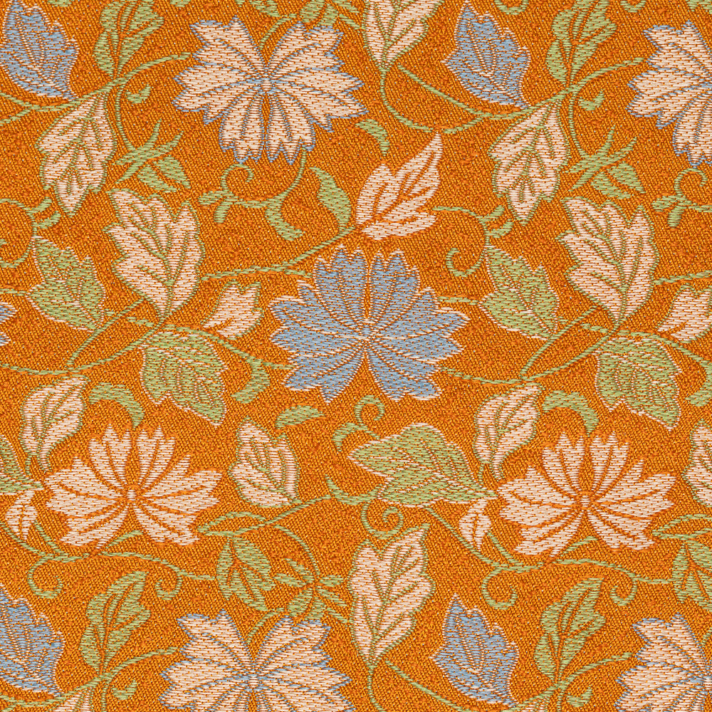 Close-up of white and pale blue chrysanthemums with scrolling vines woven on an orange nashiji-textured silk ground.