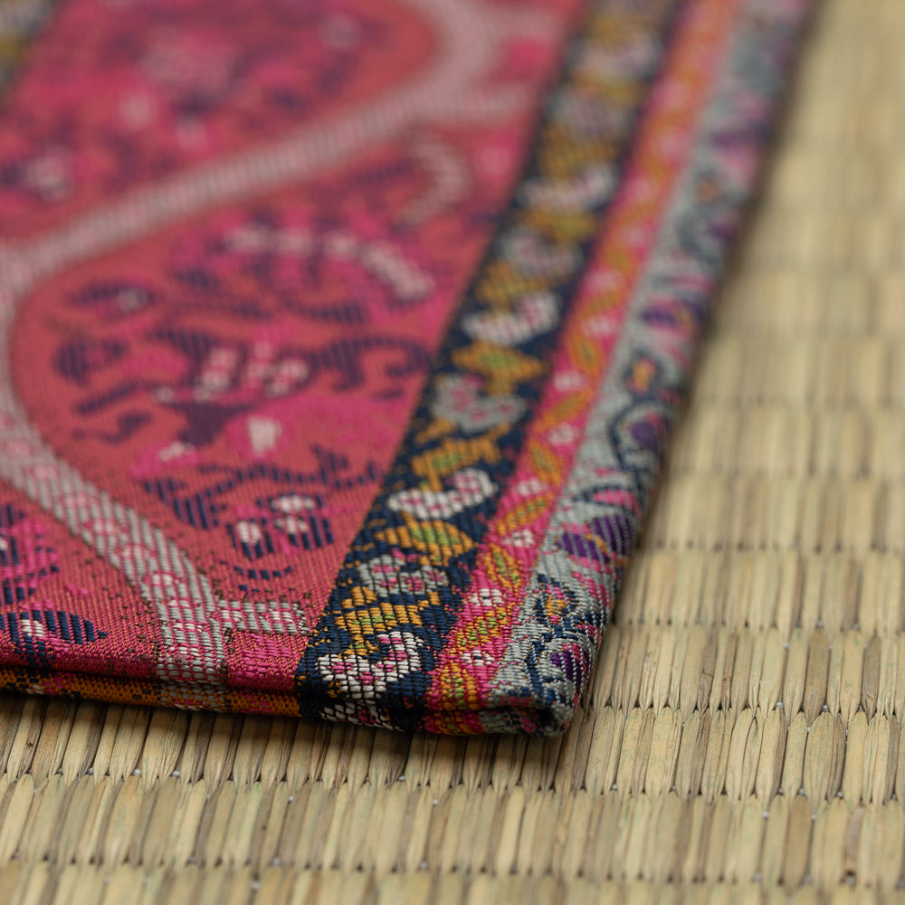 Close-up of the intricate Nishijin silk weave and colorful border detail of Perusha (Persia) Kobukusa.