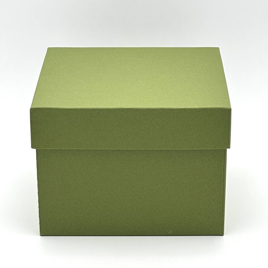 Green presentation gift box included with the hand-painted sakura and songbird matcha bowl.