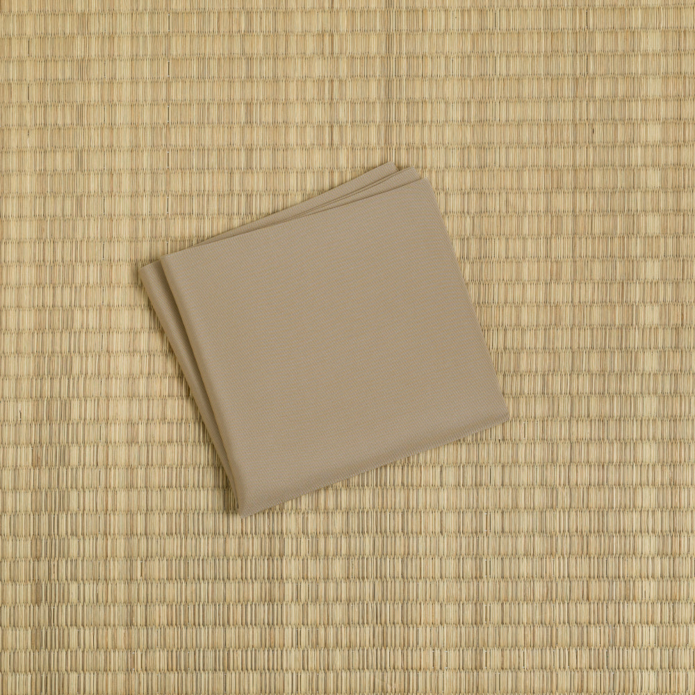 Sand beige silk fukusa displayed on tatami mat for Japanese Tea Ceremony