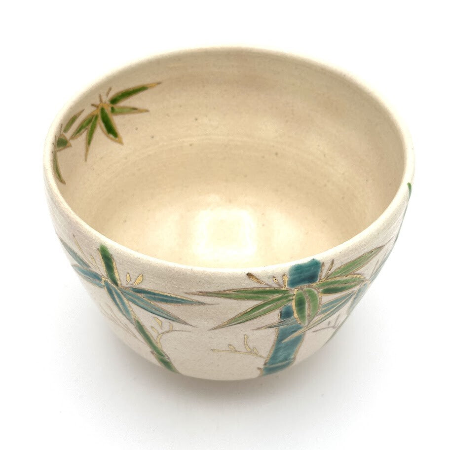 Top interior view of the Take bamboo matcha bowl showing hand-painted bamboo leaves and a gold foil accent around the rim