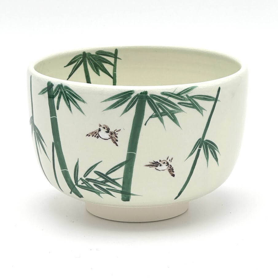 Hand-painted Kyo Ware matcha bowl with a traditional Take Suzume bamboo and sparrow motif on an ivory glaze