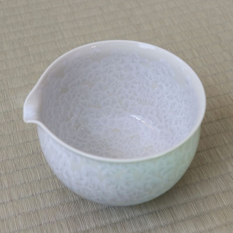 Top interior view of the Tōan Hana-Kesshō blue and white gradation katakuchi bowl showing the pouring spout and pale crystalline glaze continuing across the interior