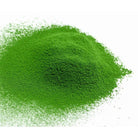 Green powder on a white background