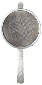 A stainless steel tea strainer with a circular mesh filter and a long, textured handle, shown against a plain white background.