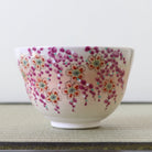 Ceramic bowl with floral pattern on a white background