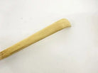 Wooden stick on a white background