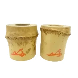 Two beige pots with red text on a white background