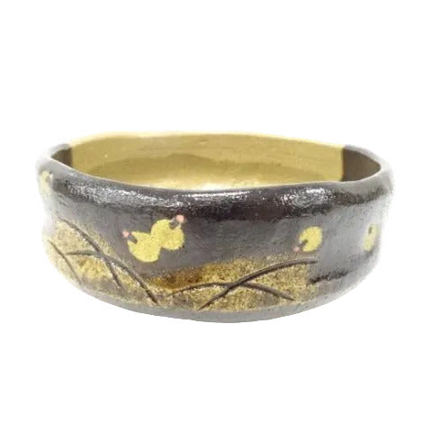 Ceramic bowl with artistic design on a white background