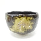 Ceramic bowl with a textured surface on a white background