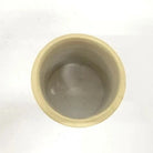 Ceramic cup on a white background