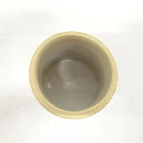Ceramic cup on a white background