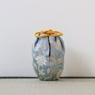 This is a shifuku (protective silk pouch) for a chaire (tea caddy) used to hold koicha (thick matcha) in the Japanese tea ceremony.