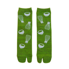 Green socks with white patterns on a white background