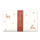 Packaged product with deer illustrations and a red label on a white background