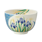 Front view of a hand-painted Kyo Ware matcha bowl decorated with deep blue kakitsubata irises, flowing blue water, green leaves, and gold accents.