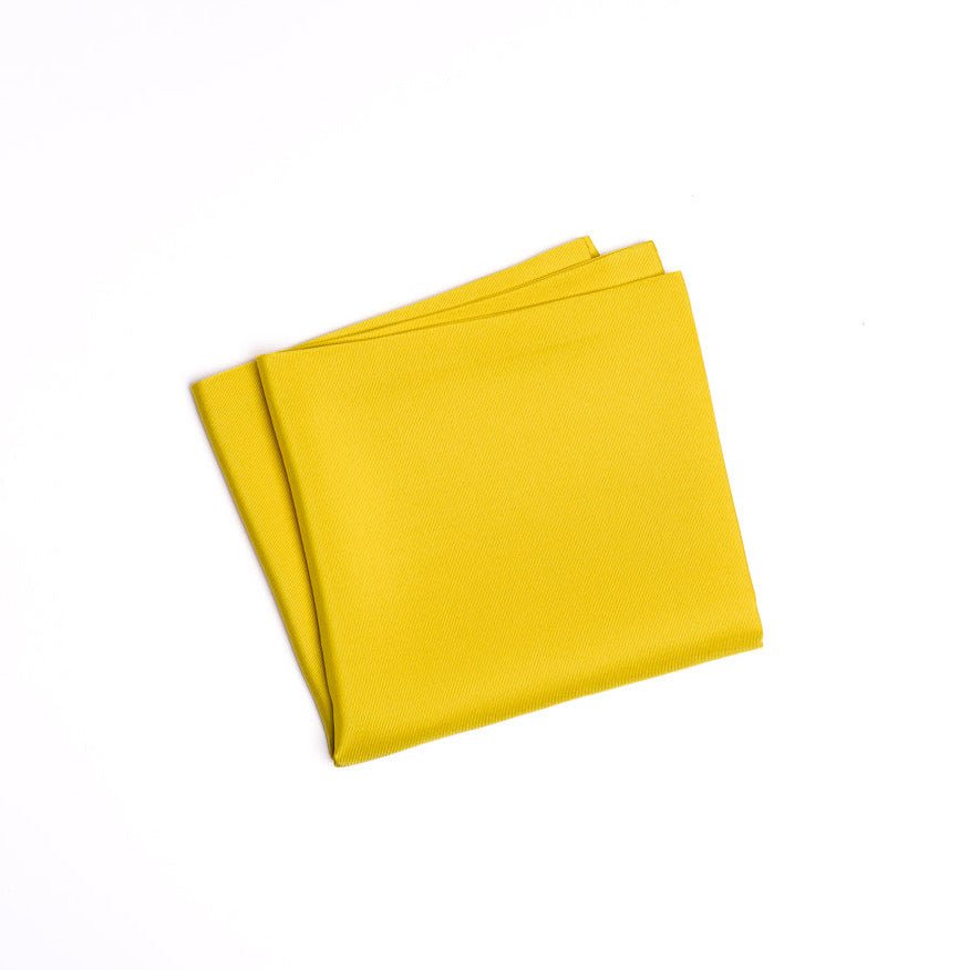 Nanohana Yellow silk fukusa cloth on a white background