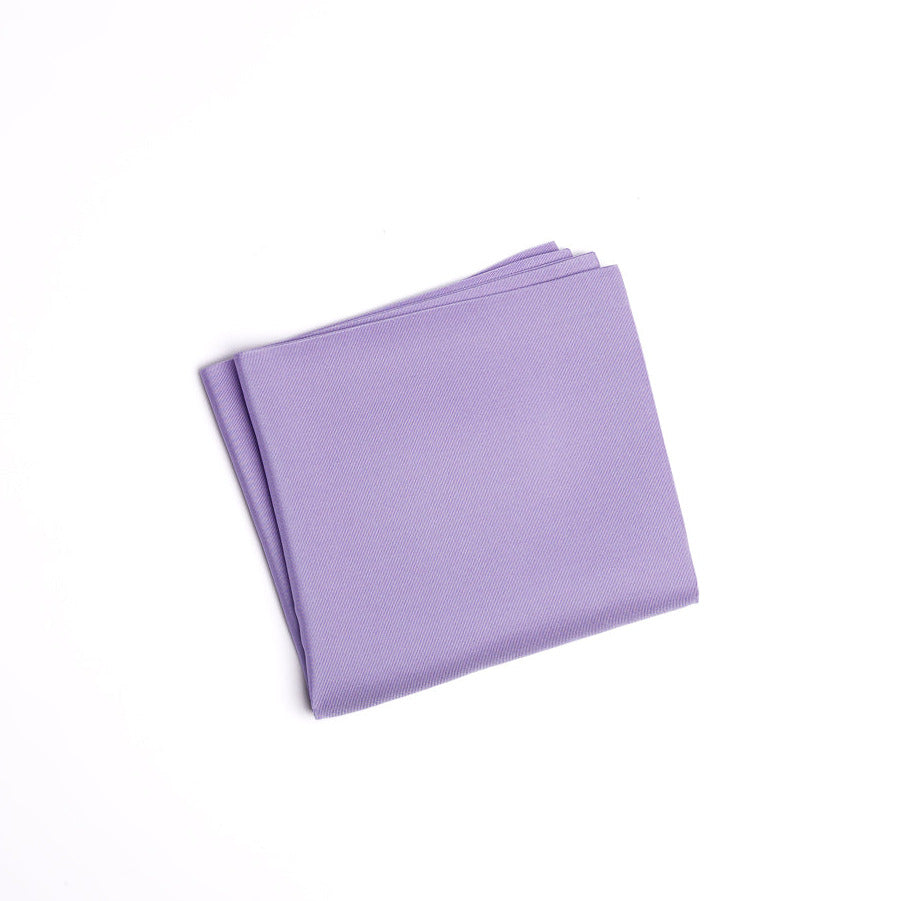 Folded purple fabric on a white background
