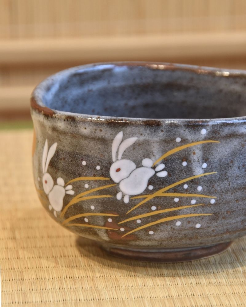 Close-up of a ceramic bowl with a rabbit
