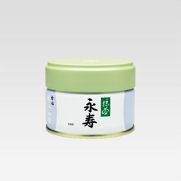 A can of EIJU Ceremonial Grade Matcha by Marukyu Koyamaen with Japanese characters displayed on the label.